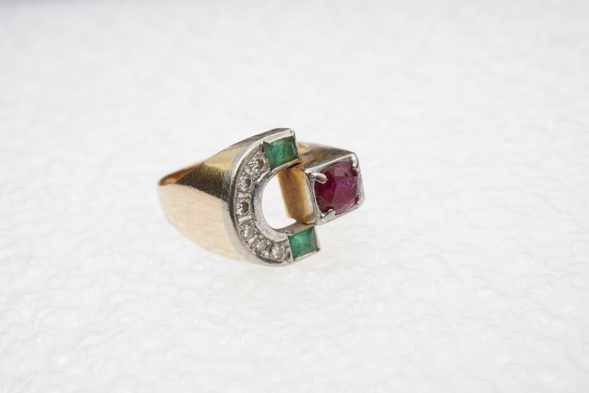 A ruby, emerald and diamond ring, mid 20th century
